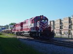 WSOR 4053 passing some new buildings downtown